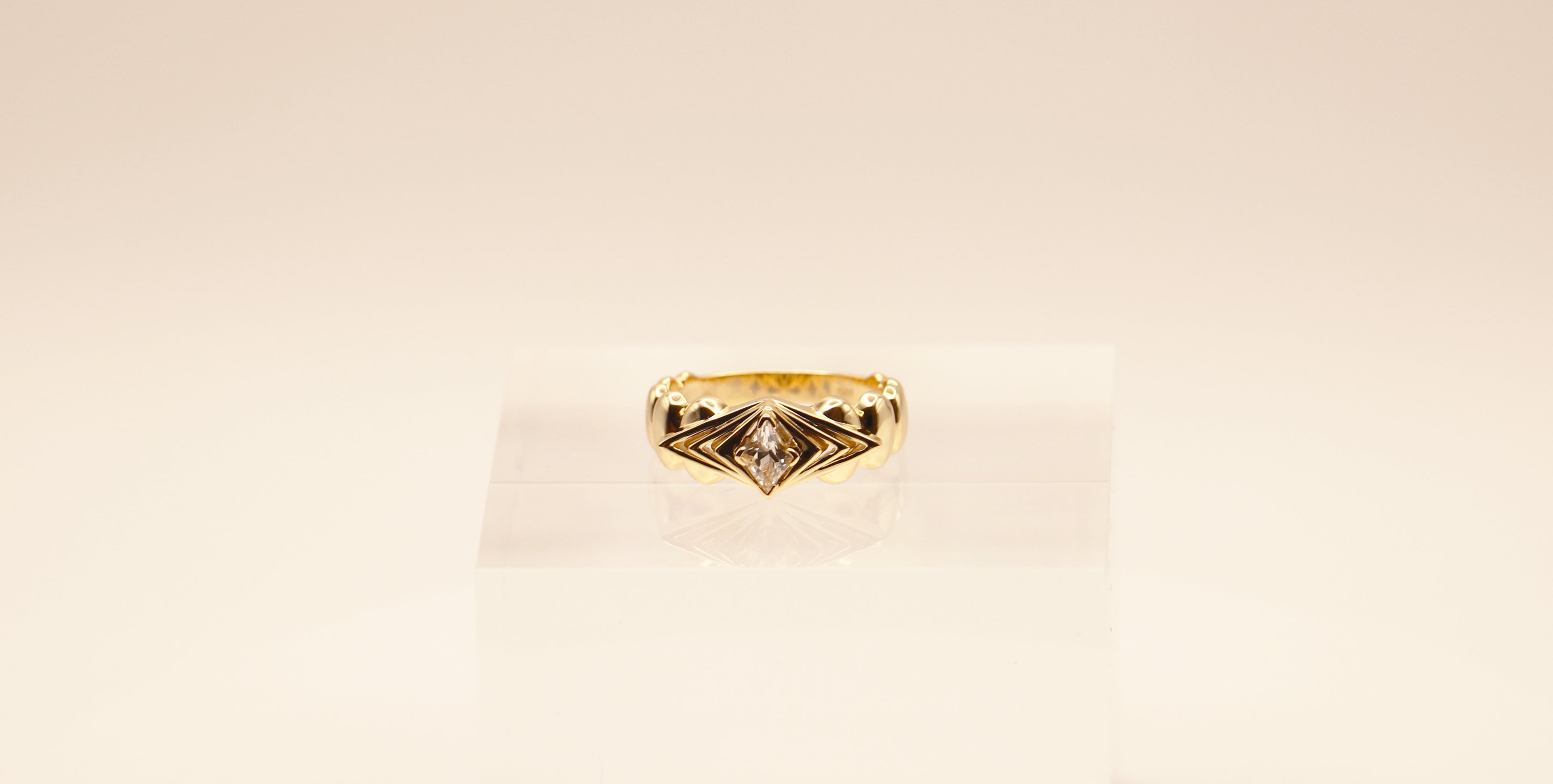 Horizon Ring in Sterling Silver plated in 14k Yellow Gold with White Topaz