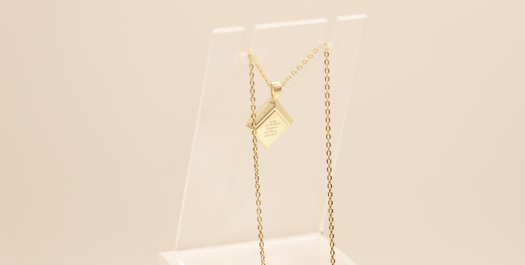 Light of the World in Sterling Silver plated in 14k Yellow Gold with White Topaz