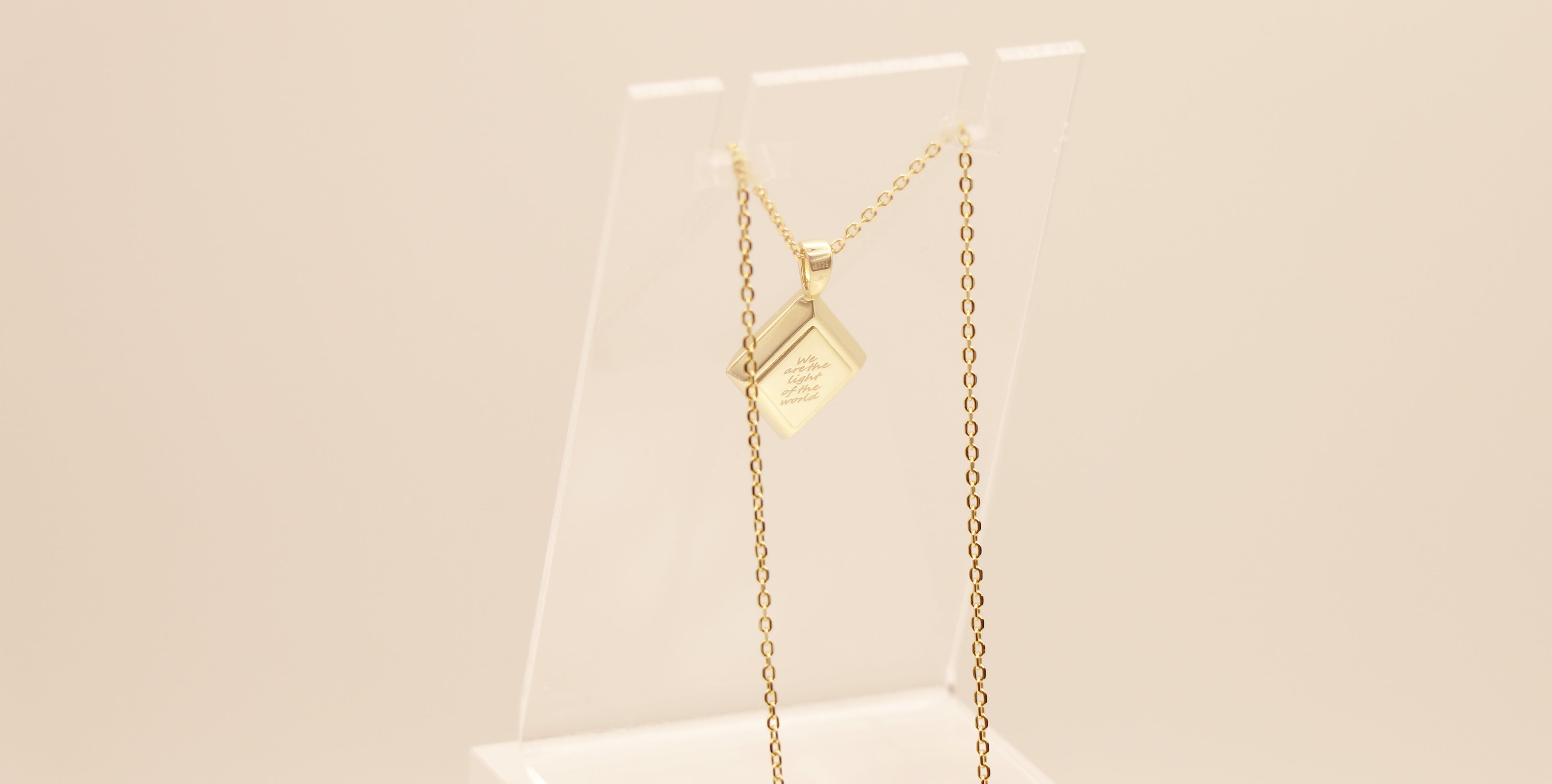 Light of the World in Sterling Silver plated in 14k Yellow Gold with White Topaz