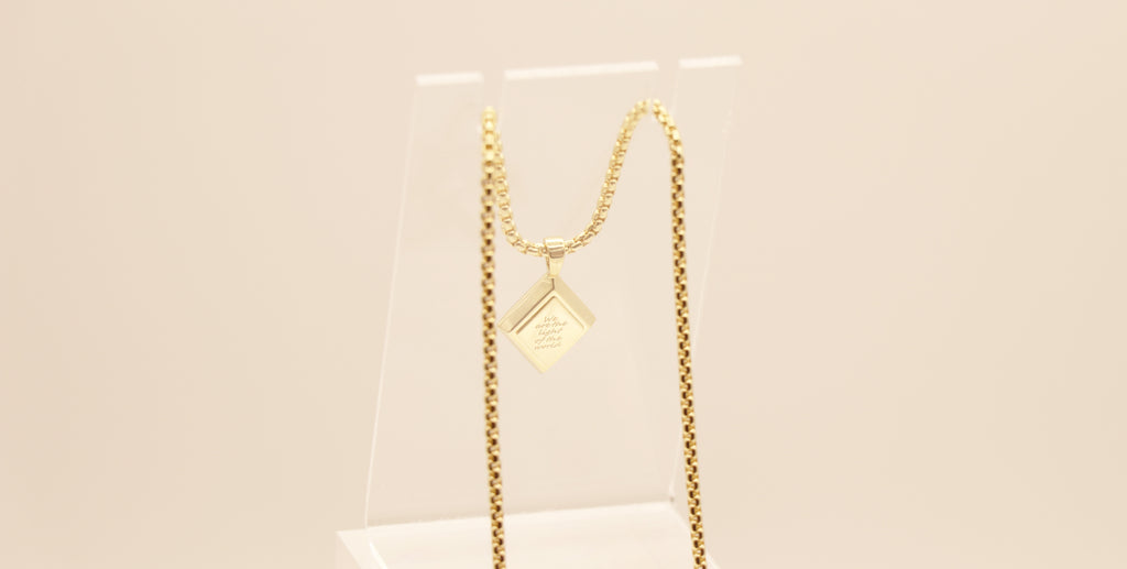 Light of the World in Sterling Silver plated in 14k Yellow Gold with White Topaz