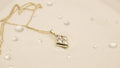 Light of the World in Sterling Silver plated in 14k Yellow Gold with White Topaz