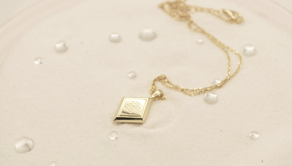 Light of the World in Sterling Silver plated in 14k Yellow Gold with White Topaz