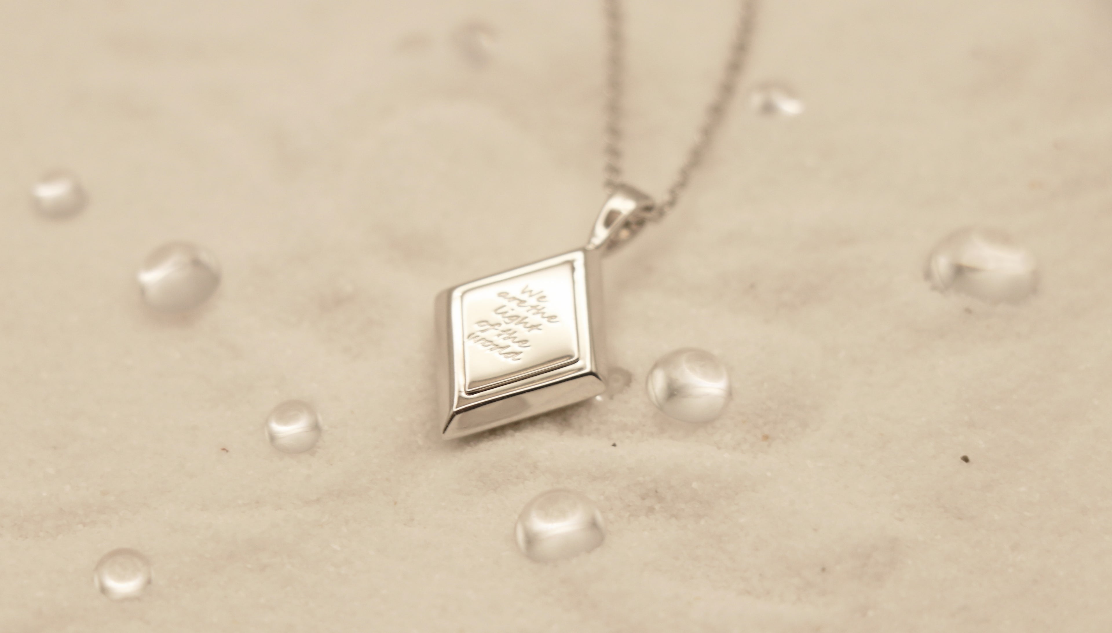 Light of the World in Sterling Silver and White Topaz