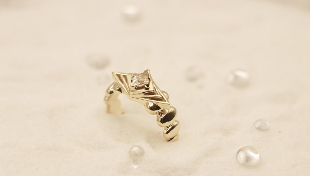 Horizon Ring in Sterling Silver plated in 14k Yellow Gold with White Topaz