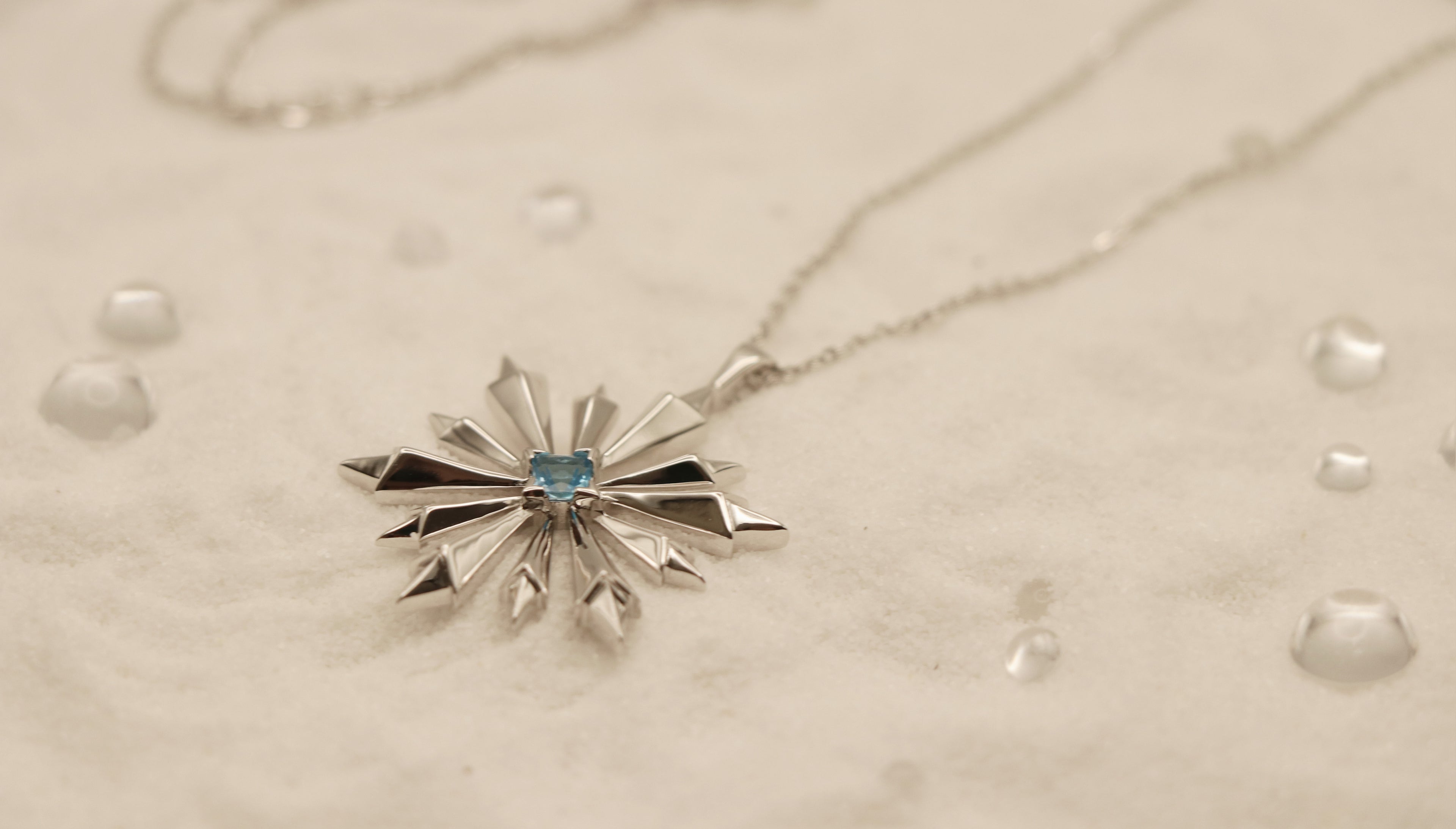 Star of Bethlehem Necklace in Sterling Silver with Blue Topaz