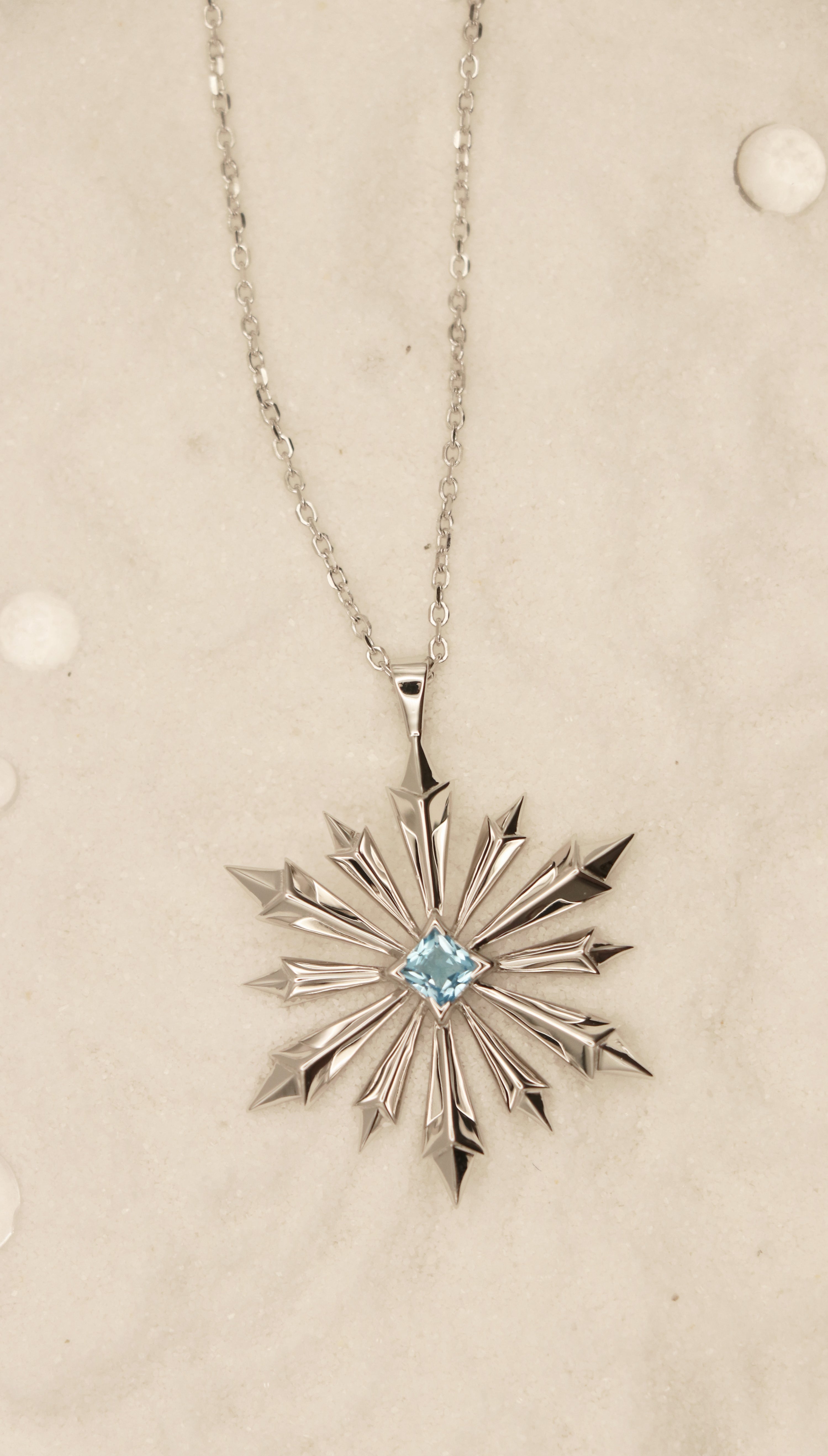 Star of Bethlehem Necklace in Sterling Silver with Blue Topaz