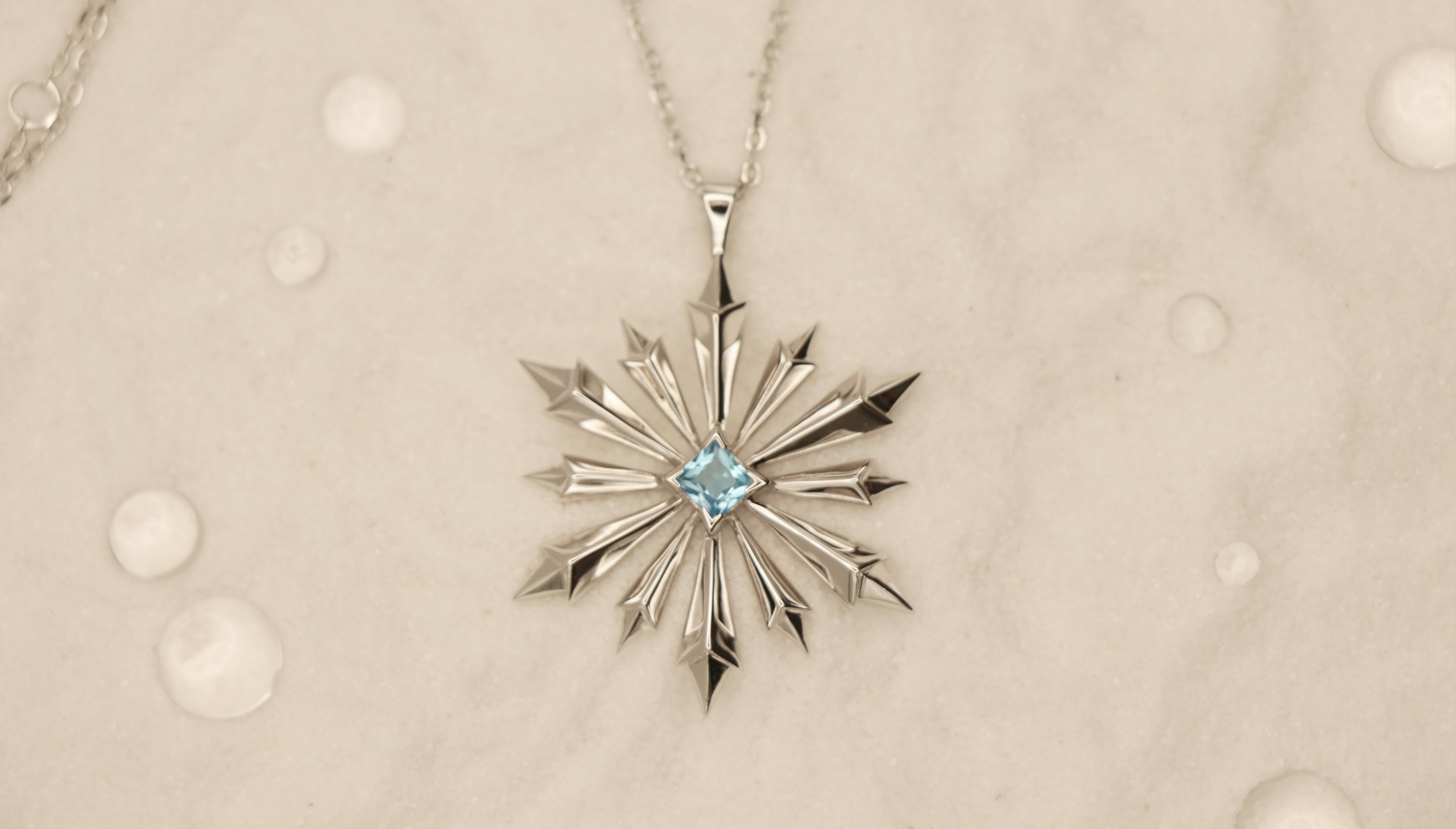 Star of Bethlehem Necklace in Sterling Silver with Blue Topaz