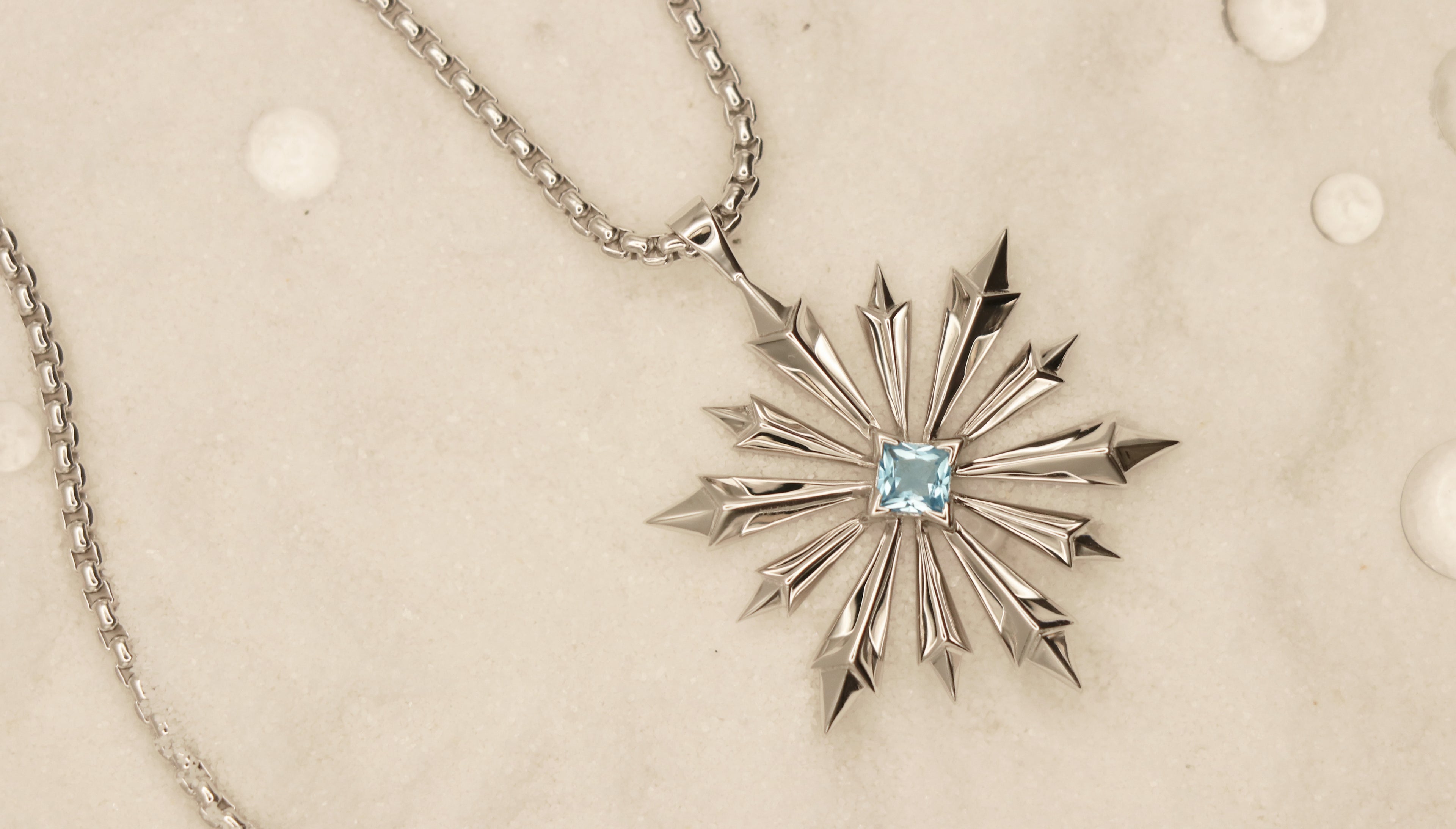 Star of Bethlehem Necklace in Sterling Silver with Blue Topaz