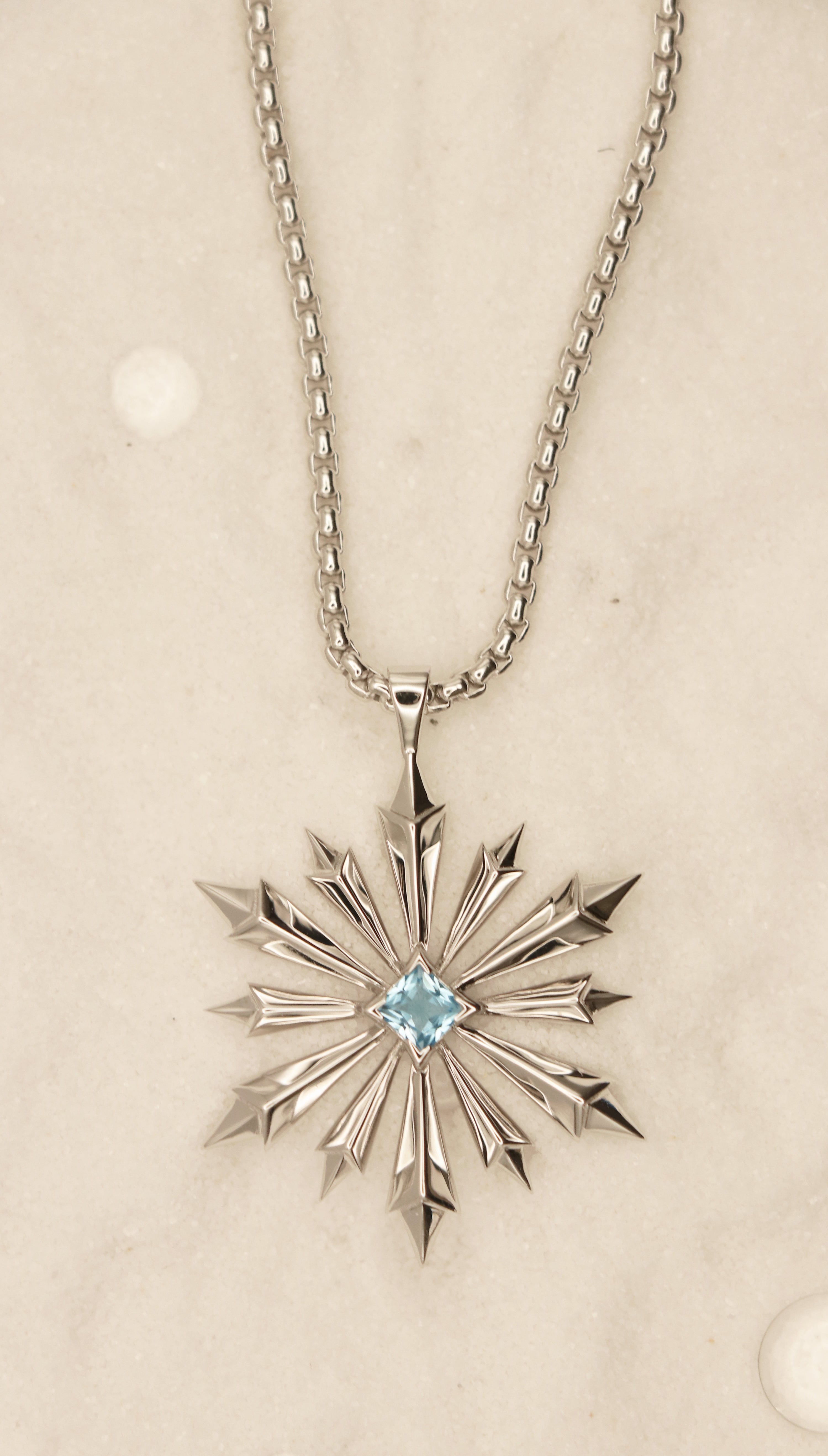 Star of Bethlehem Necklace in Sterling Silver with Blue Topaz