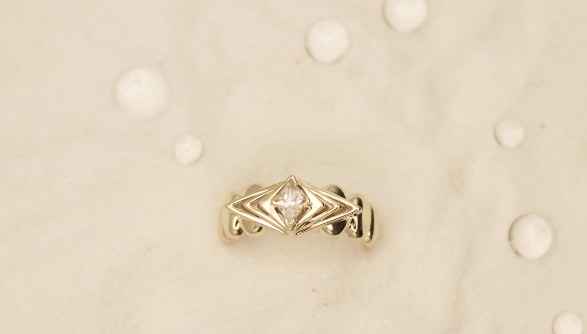 Horizon Ring in Sterling Silver plated in 14k Yellow Gold with White Topaz - Chelle Jewelry